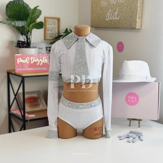 White jazz dance costume with rhinestone collar, crystal tie detail, long sleeves, and high-waisted bottoms displayed on a mannequin.